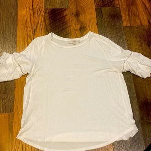 White shirt sleeve. Eyelet sleeves. Tshirt type material. Brand LOFT SZ L. NWOT
